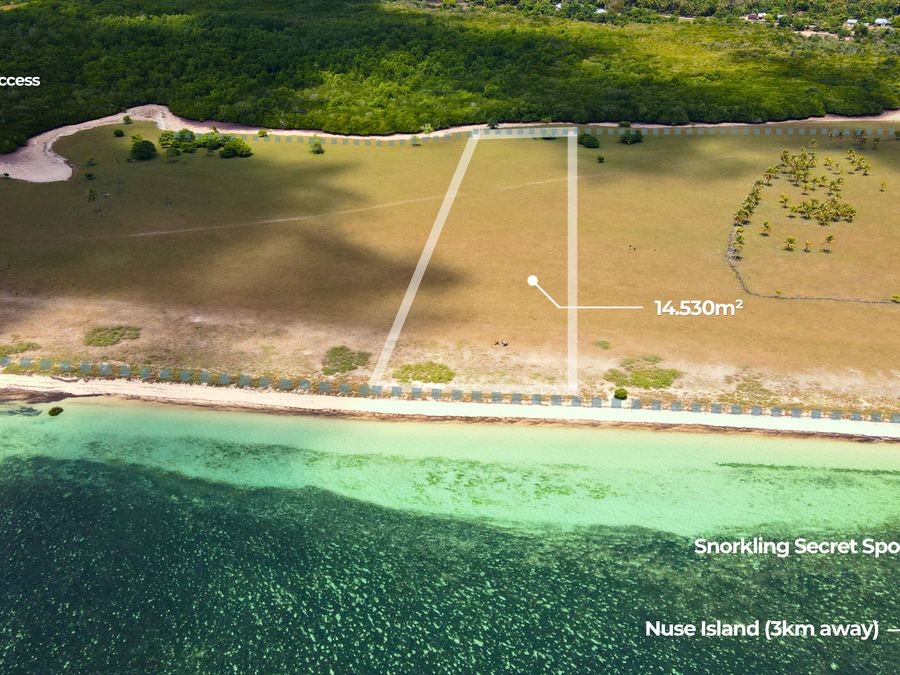 Tongga white sand beachfront facing Nuse Island reef